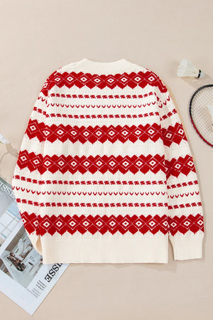 Fair Isle knit crewneck pullover sweater in white with red diamond and stripe pattern.