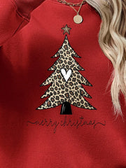 Red sweatshirt with leopard print Christmas tree graphic and Merry Christmas text.