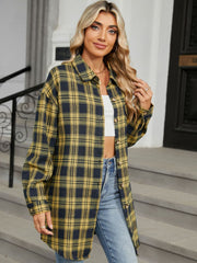 Oversized yellow and black plaid shacket with button front and collar.