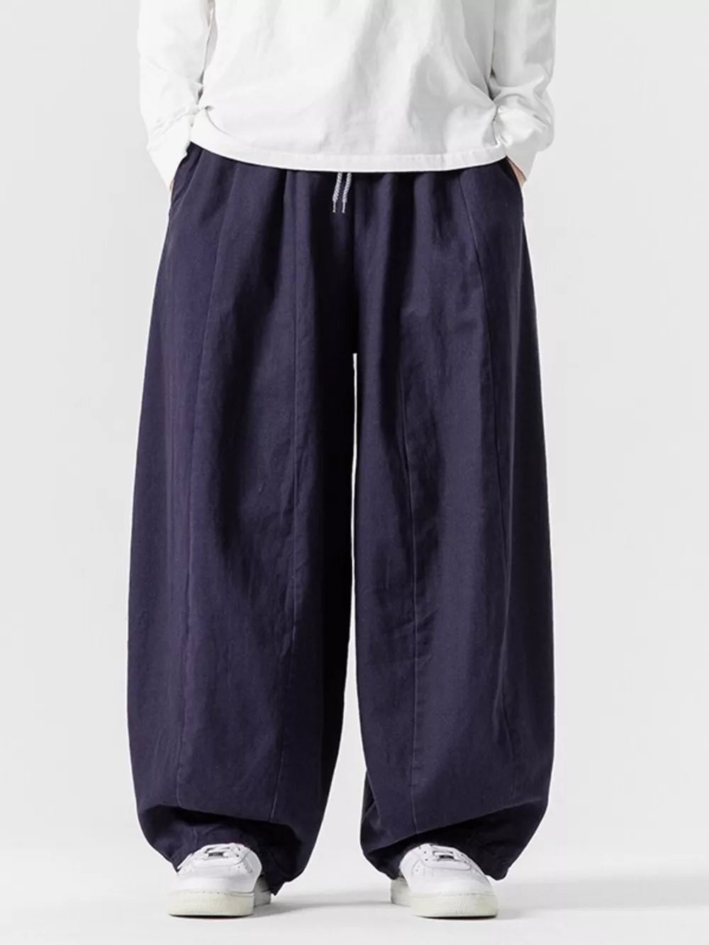 Navy relaxed fit sweatpants with drawstring waist and wide leg