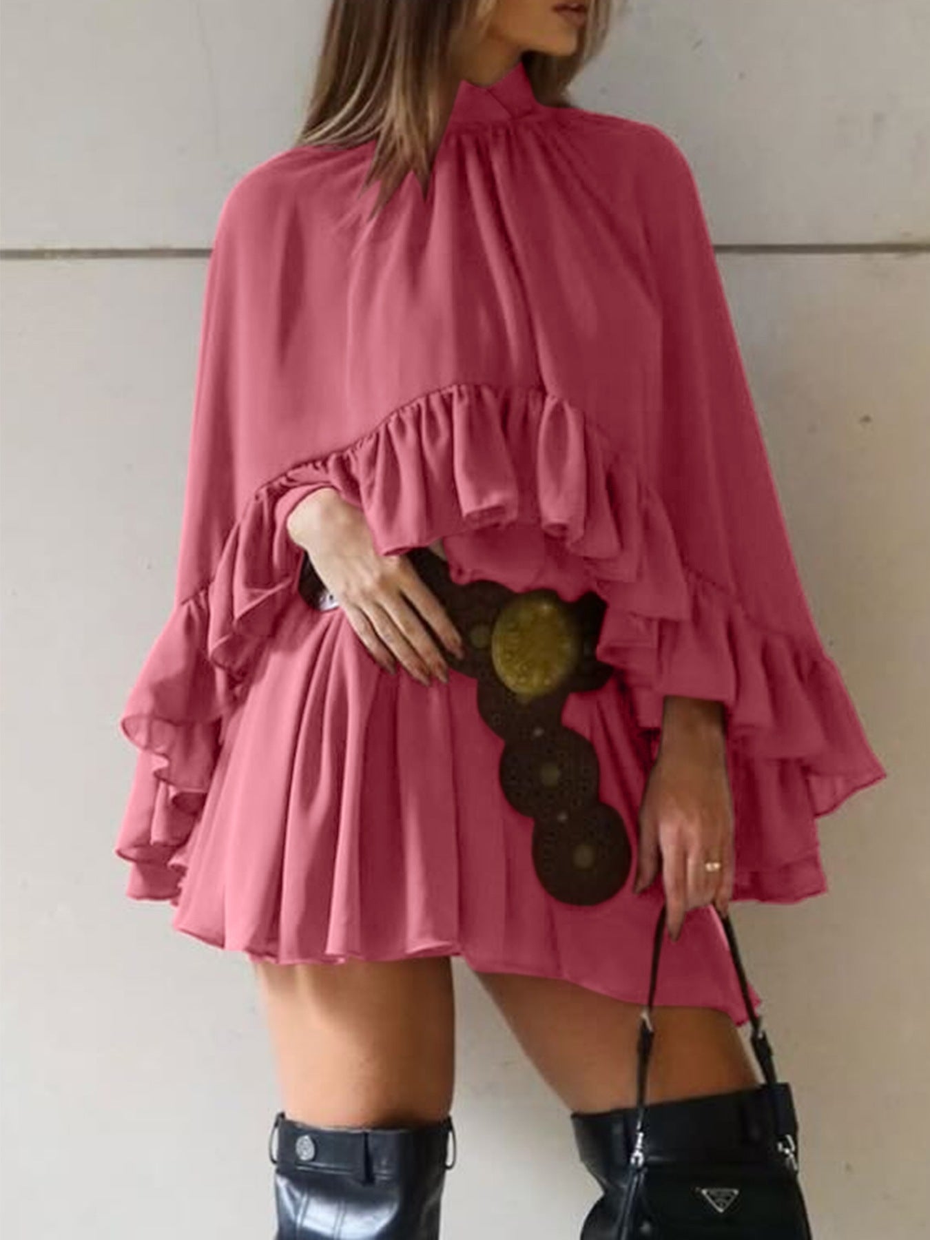 Elegant deep rose mini dress with ruffle trim, high neck, and tiered ruffled sleeves.