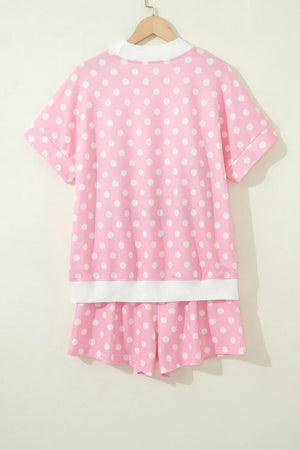 Pink polka dot polyester top and shorts set with white trim