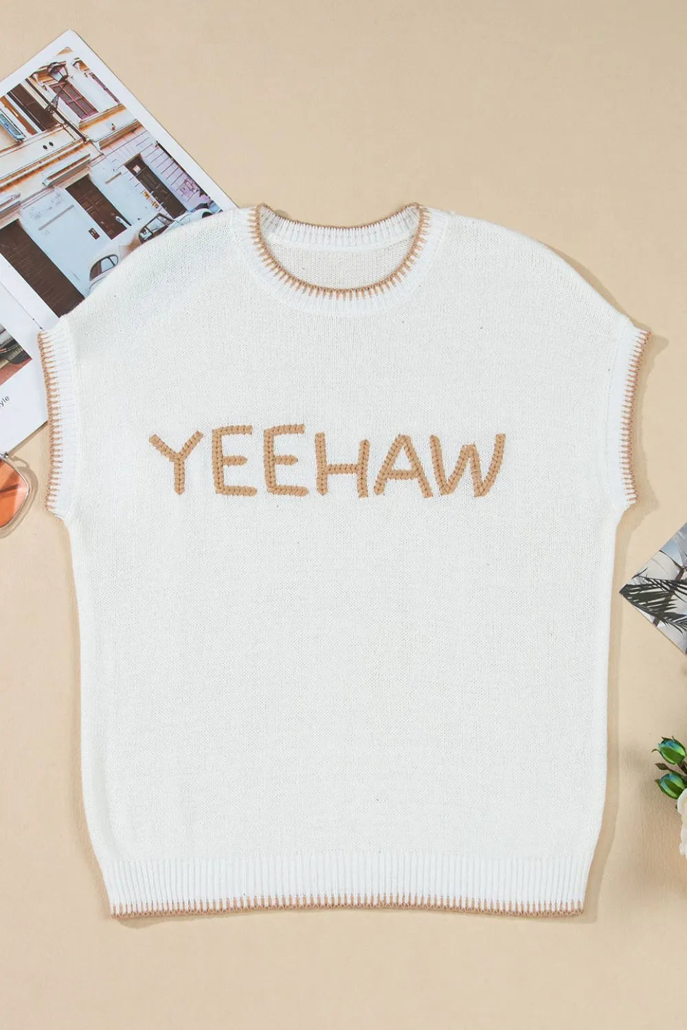 White knit top with embroidered YEEHAW and stitch trim detail