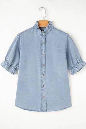 Light blue denim blouse with ruffled collar, puff sleeves, and button front.