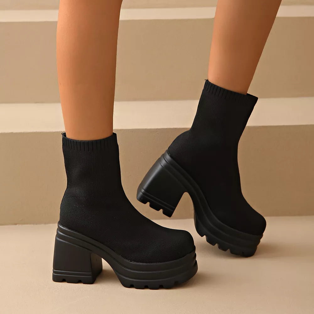 Black knit ankle boots with round toe and chunky platform heel