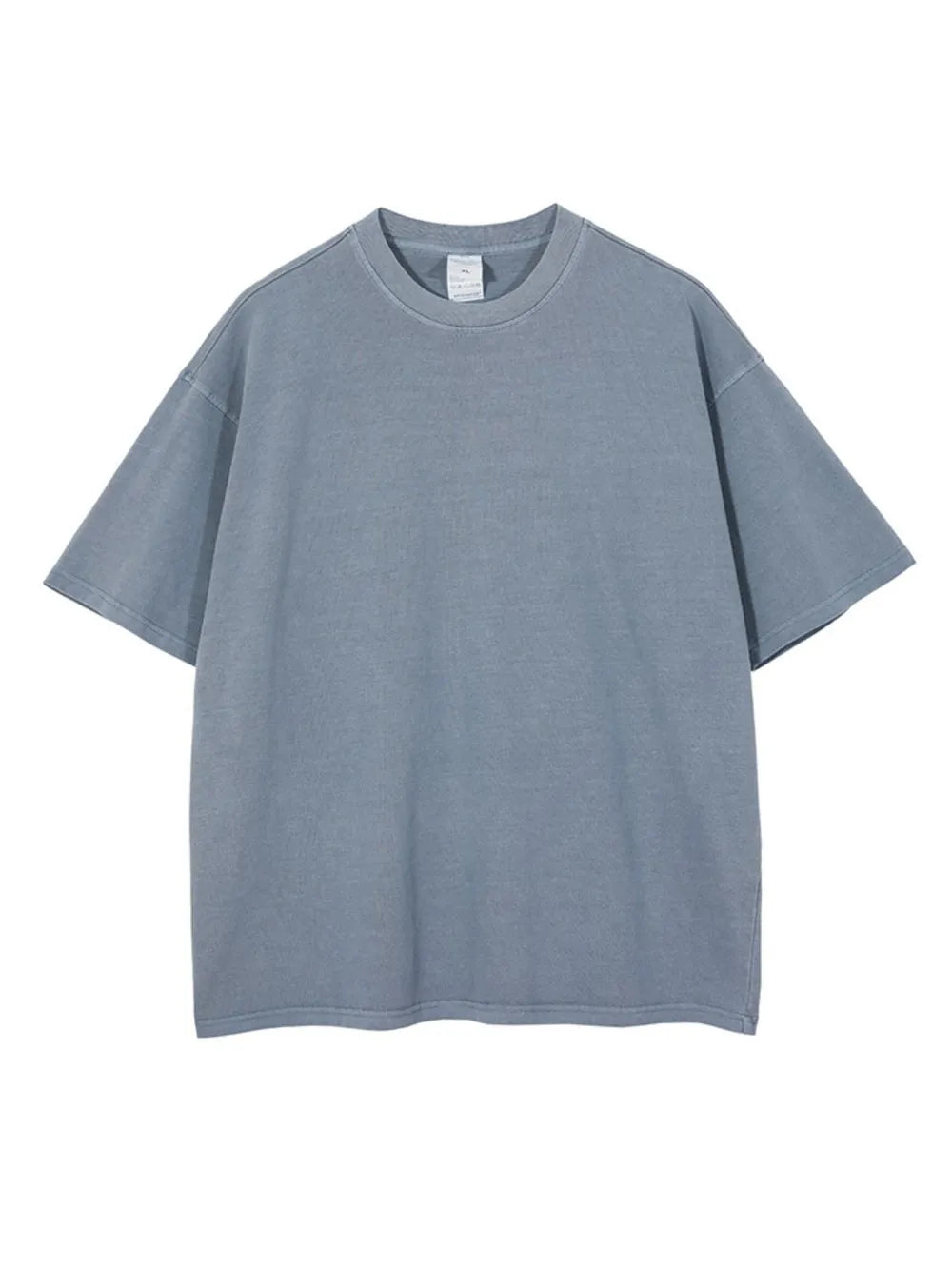Oversized washed cotton tee in Dusty Blue with relaxed fit and crew neck.