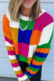 Patchwork knit crewneck pullover sweater in bright color blocks and stripes.