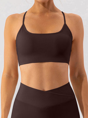 Chocolate ribbed halterneck active bra with square neckline and thin straps.