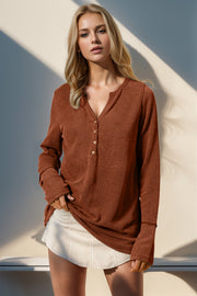 Waffle knit henley shirt in caramel with button placket and thumbhole cuffs.