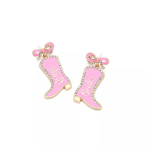 Pink bridal cowboy boot dangle earrings with rhinestone trim and bow detail