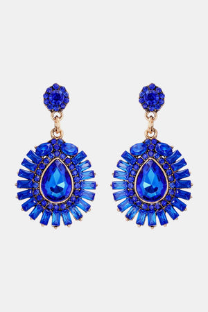 Royal blue dangle earrings with teardrop and baguette gemstones.