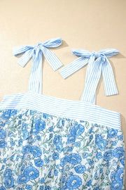 Floral print camisole top with blue striped tie straps and matching shorts set.