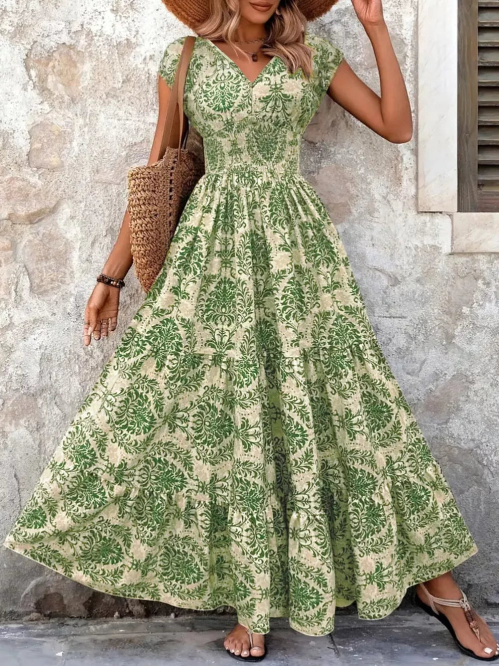 Green floral tiered maxi dress with smocked bodice and v-neck