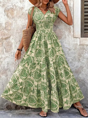 Green floral tiered maxi dress with smocked bodice and v-neck