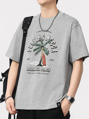 Men's grey cotton blend graphic tee with palm tree and surfboard design.