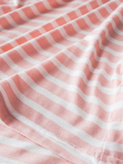Striped built-in bra tee in pale blush and white, showing fabric detail.