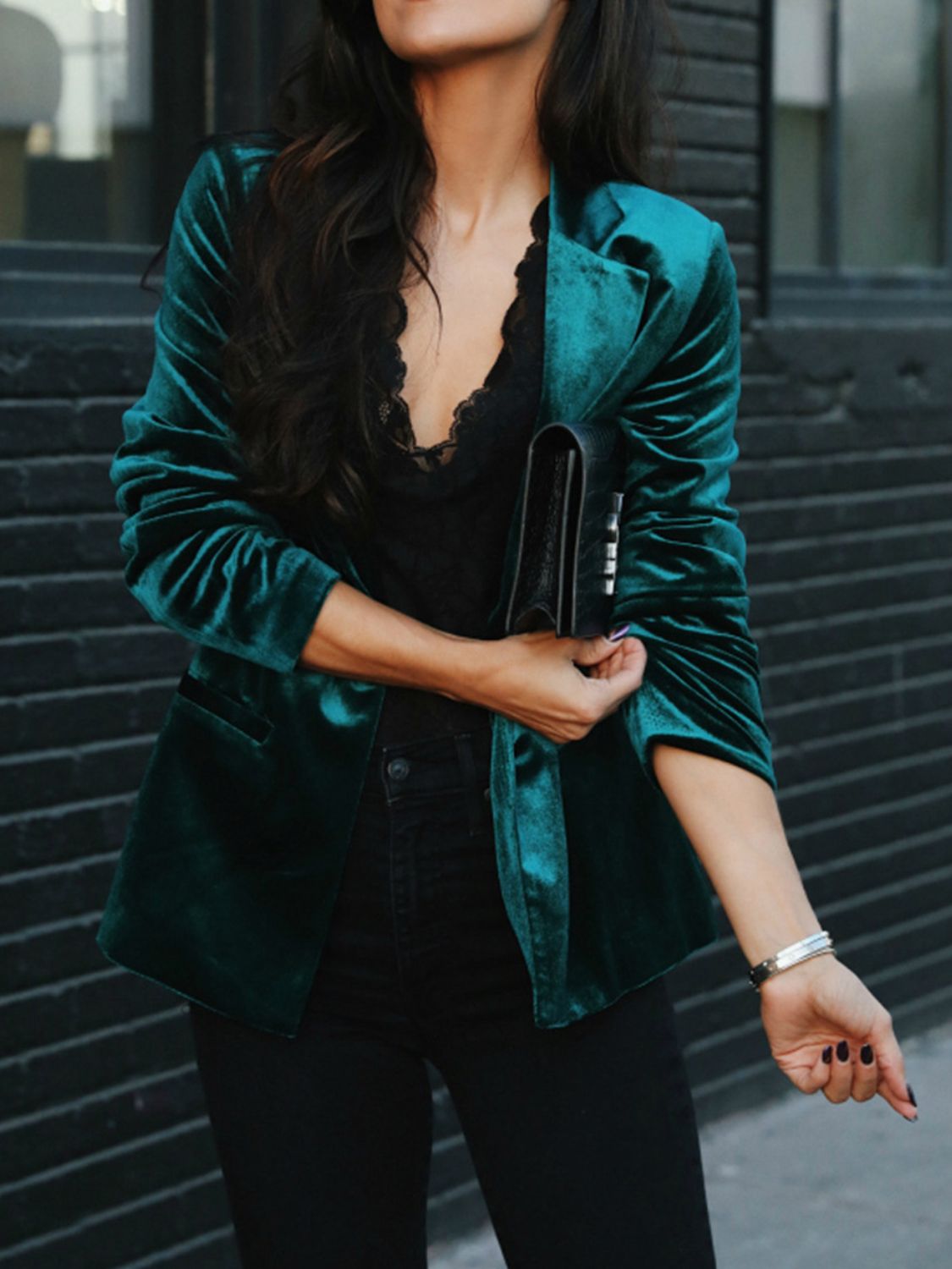 Deep Teal velvet tailored blazer with button closure and black trim detail.