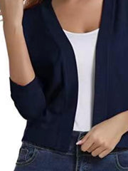 Dark Navy cropped knit cardigan with elbow sleeves and open front, worn over a white tank top.