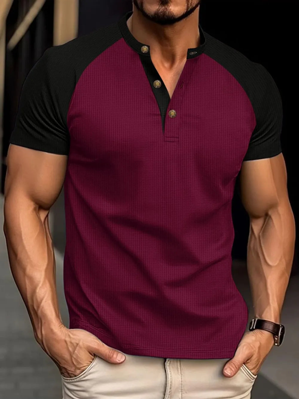 Burgundy raglan henley polo shirt with black sleeves and gold buttons
