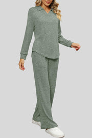 Sage ribbed knit lounge set with collar, long sleeves and wide leg pants with pockets.