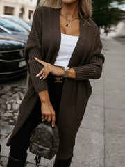 Brown ribbed texture longline knit cardigan with open front and relaxed fit.