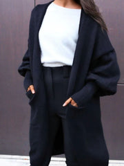 Black acrylic maxi cardigan with balloon sleeves and pockets
