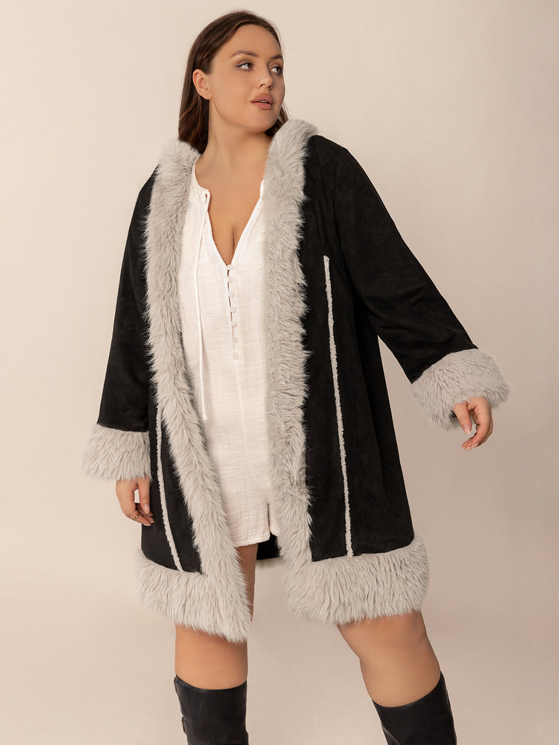 Black hooded duster coat with faux shearling trim and cuffs