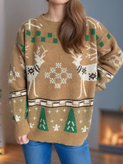 Tan acrylic knit sweater with reindeer, snowflake, and Christmas tree motifs.