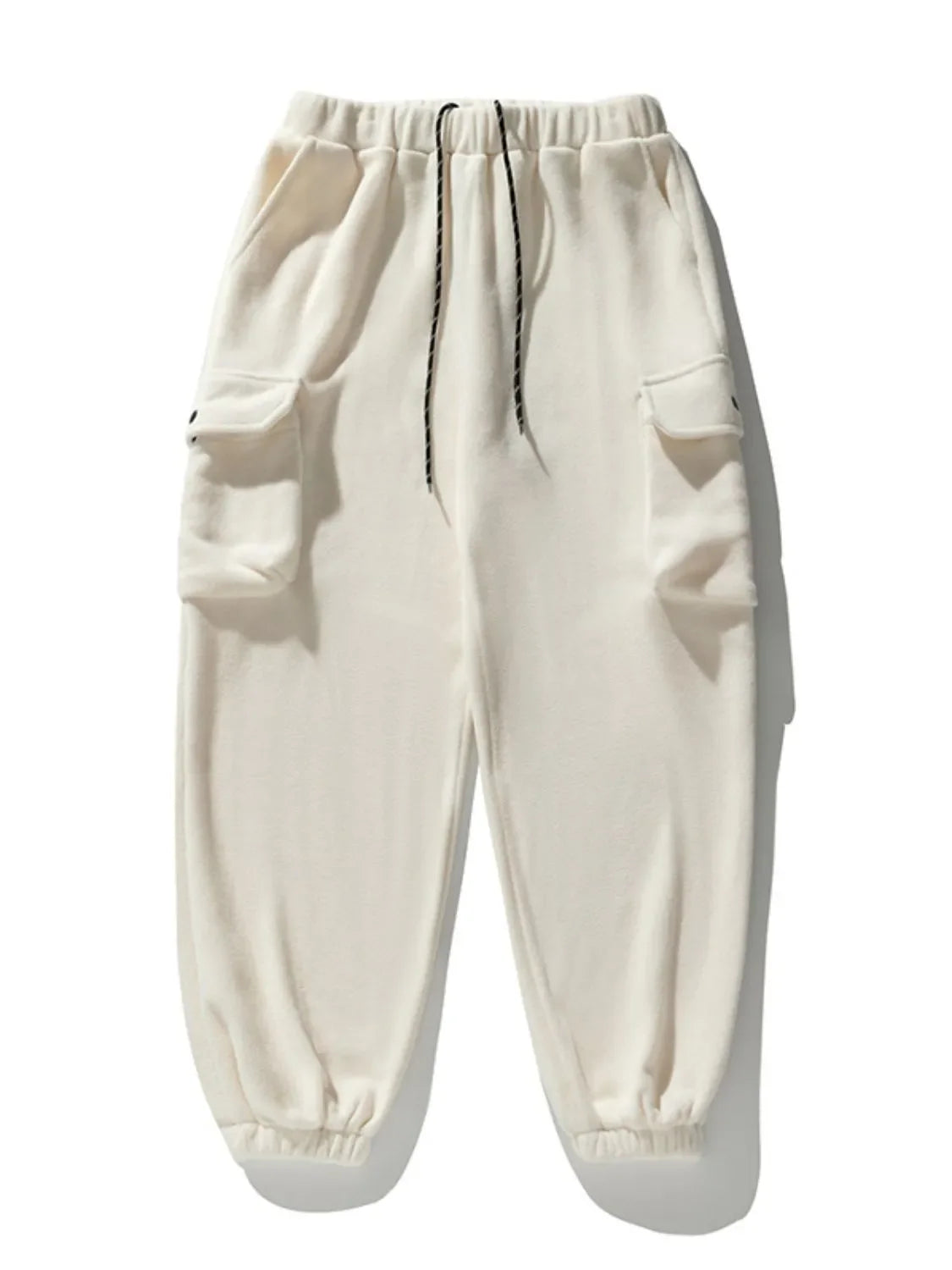 Ivory fleece cargo jogger trousers with drawstring waist and elastic cuffs.