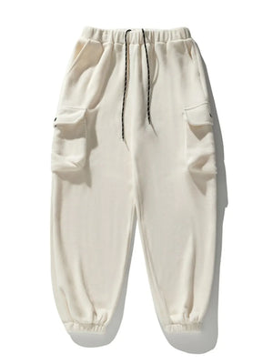 Ivory fleece cargo jogger trousers with drawstring waist and elastic cuffs.