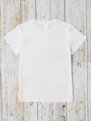 White oversized graphic tee with crew neck and short sleeves.
