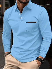Light blue long-sleeve polo shirt with chest pocket and black trim detail.