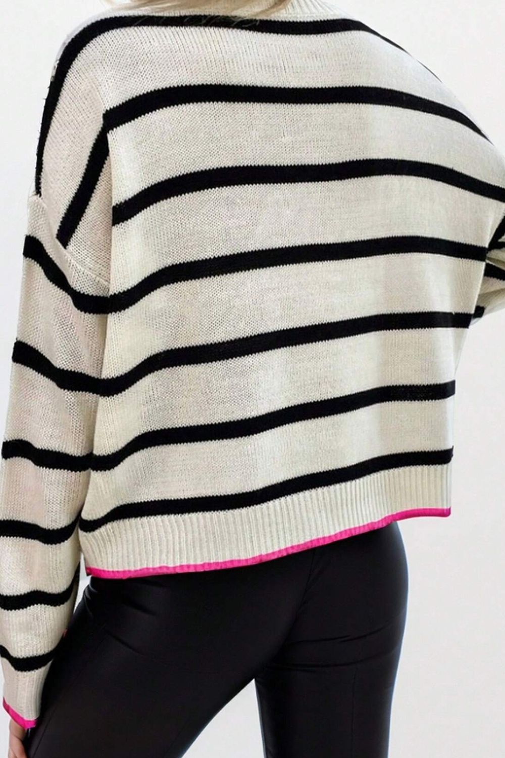 Stripe knit sweater with contrast pink trim and black stripes
