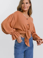 Ochre textured puff sleeve blouse with ruffled cuffs and tie front
