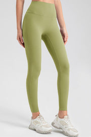 Matcha green high-waist performance leggings with sculpting seams.