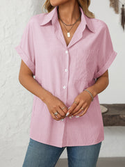 Blush pink striped button-down shirt with cuffed short sleeves and a chest pocket.