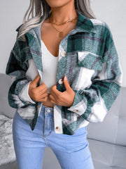 Oversized dark green tartan shacket with patch pockets and button front.