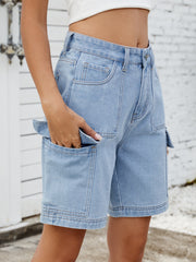 Light blue denim Bermuda cargo shorts with multiple pockets and contrast stitching.