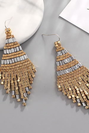 Geometric beaded fringe earrings with gold and silver beads.