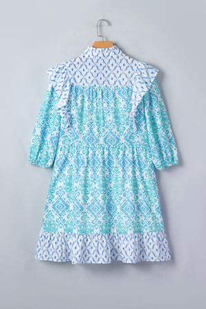 Blue patchwork ruffle mini dress with balloon sleeves and tiered hem.