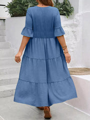 Navy blue tiered midi dress with ruffle sleeves and crinkled texture