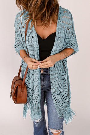 Light blue open knit chevron fringe cardigan with short sleeves and boho styling.