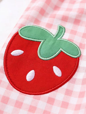 Pink gingham toddler dress with strawberry appliqué detail
