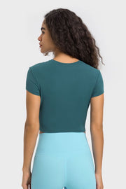 Teal ribbed crewneck crop top with short sleeves