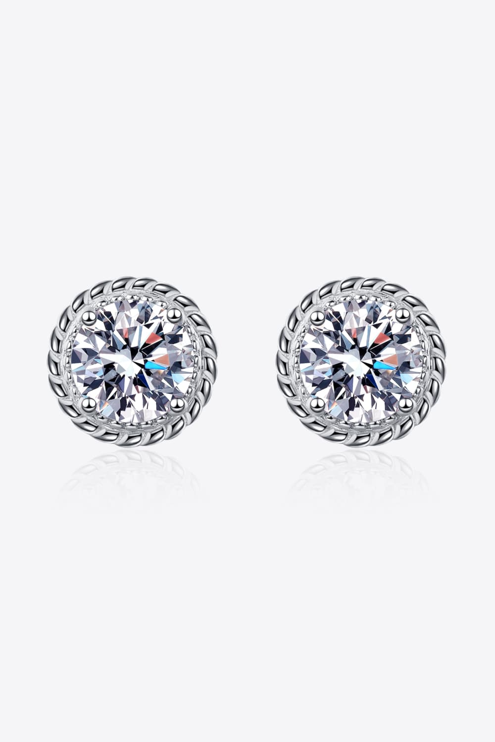 Sterling silver stud earrings with round moissanite and rope-style frame