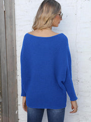 Blue ribbed dolman knit sweater with off-the-shoulder neckline.