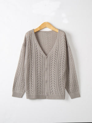 Gray chevron knit lightweight cardigan with V-neck and button front.