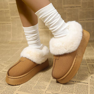 Brown plush suede platform ankle boots with fluffy white trim and white slouch socks.