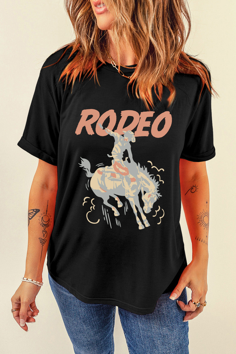 Black rodeo graphic tee with rolled sleeves and a bucking bronco design.