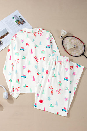White festive print pajama set with contrast trim and long sleeves.